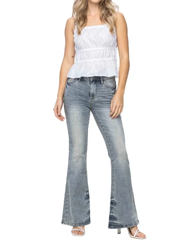 Youthful Style Mid Rise Tinted Pin Tack Detailed Flare Jean In Light Wash